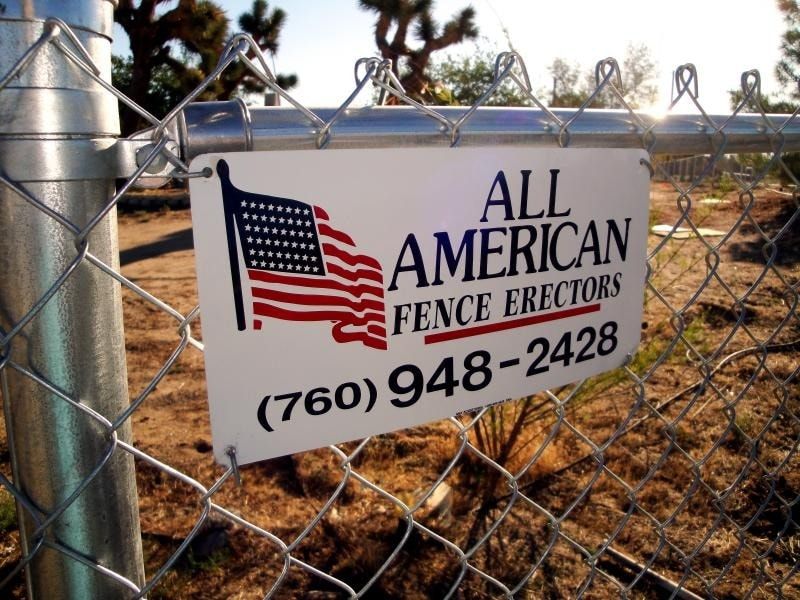 Commercial Fence Company All American Fence Erectors’ Sign on Chain Link Fence in Hesperia