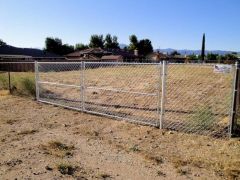 5' chain link, 16' double swing gate (cut in old exist fence)