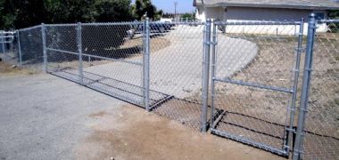 residential chain link fence with a gate