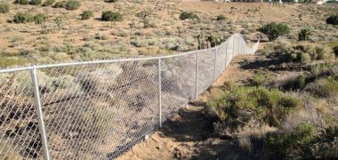 long chain link fence in High Desert, CA
