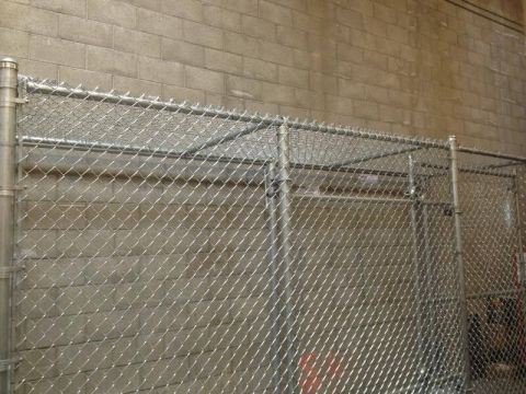 8 foot tall commerical cage inside grocery store