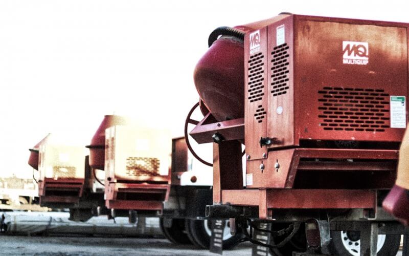 close up of red construction equipment