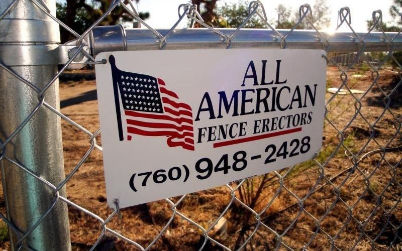 Commercial Fence Company All American Fence Erectors’ Sign on Chain Link Fence in Hesperia