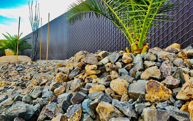 A privacy fence installed by a chain-link fence contractor gives you security and beauty