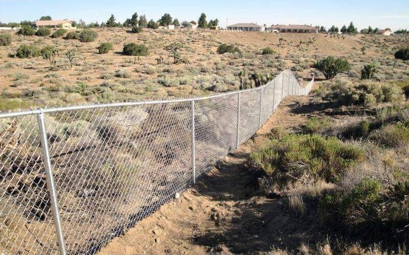 long chain link fence in High Desert, CA