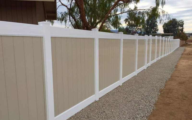 A privacy vinyl ranch fence installed by All American Fence Erectors